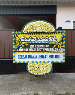 Papan Bunga Duka di Sawai