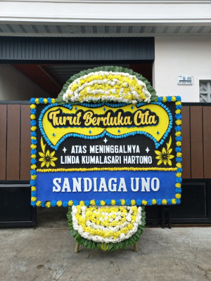 Papan Bunga Duka di Sawai